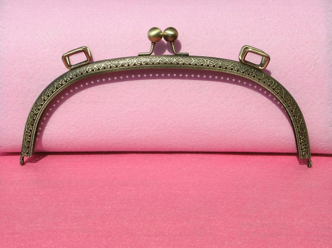 Fermoir porte monnaie coudre 25cm